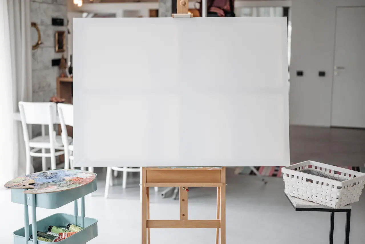 Do you need to re-apply gesso on an already primed canvas?